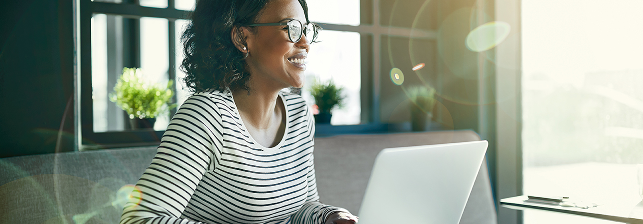 lady smiling with laptop