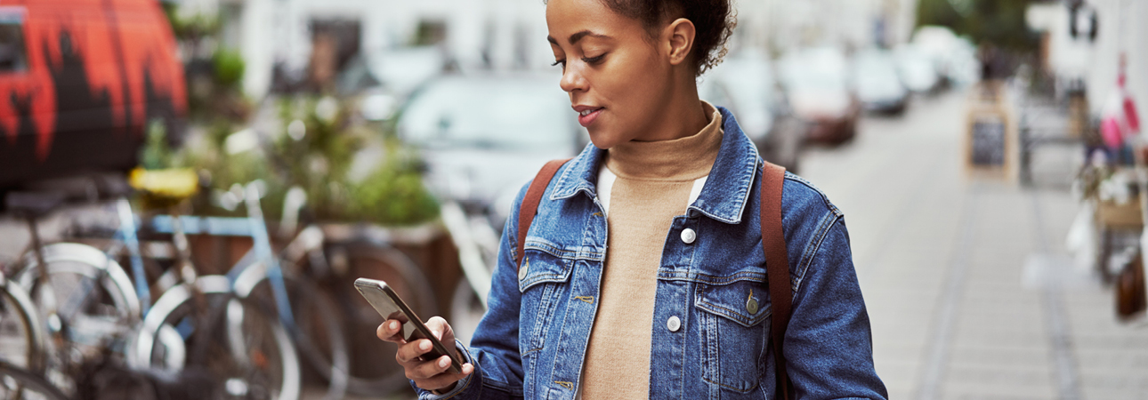woman looking at her phone