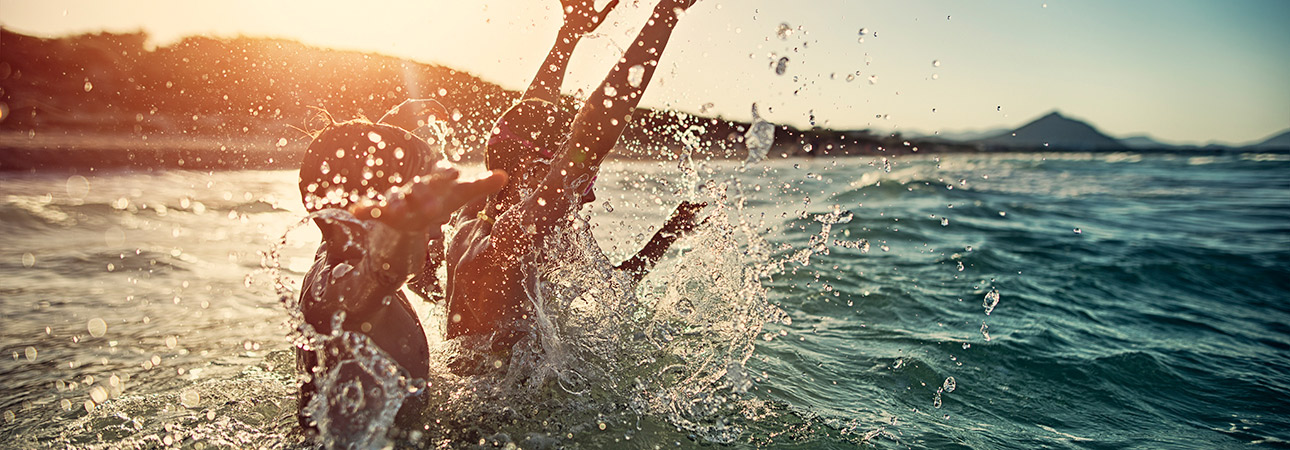 people in lake having fun